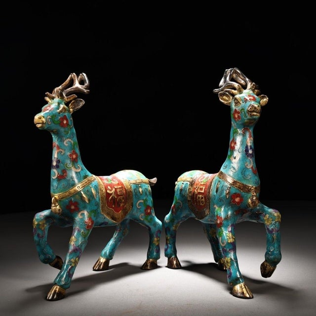 Beautiful pair of handcrafted cloisonne enamel deer sculptures with gilt detailing, ideal for tabletop display, mantel...