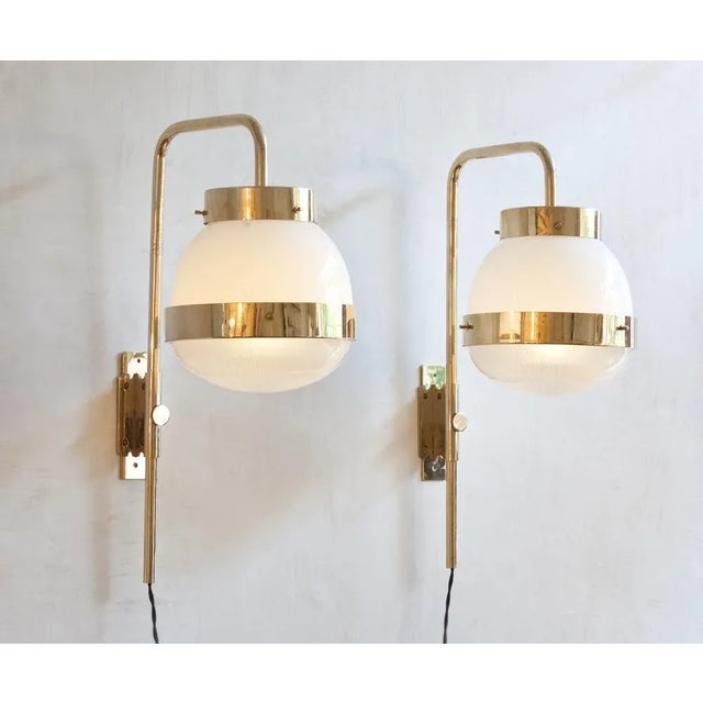 The wall lights were designed by the Italian designer Sergio Mazza in the 60s for Artemide. The lamp consists of two...