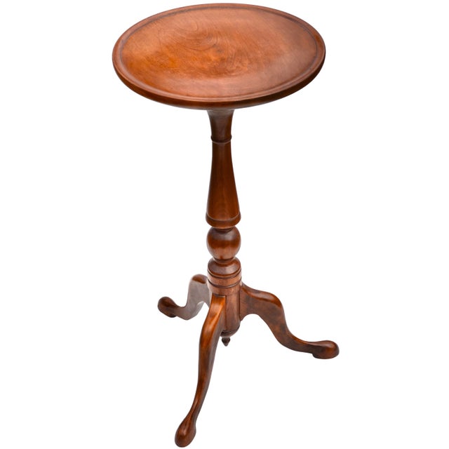 Stunning antique Victorian oak plant stand exhibiting an elegant sleek sculptural silhouette and ornate hand-carved...