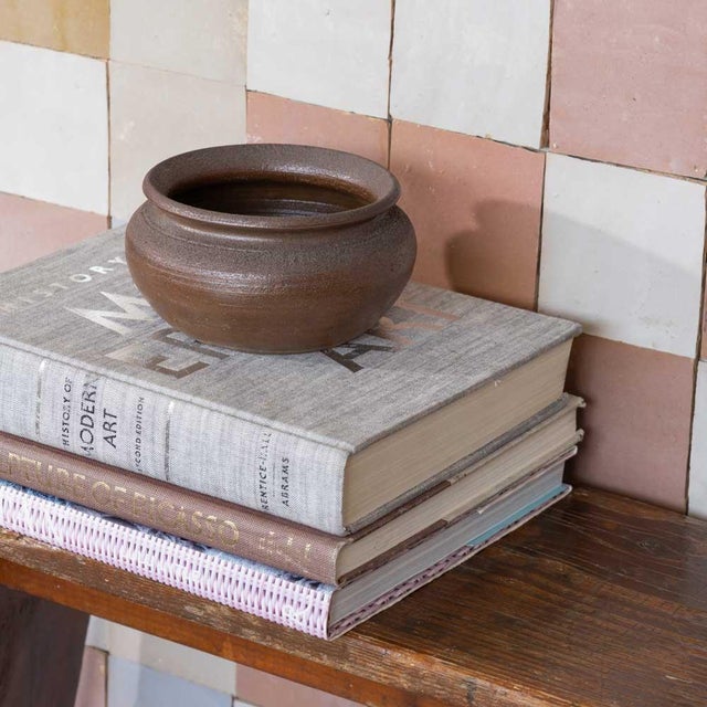 Beautiful Bizen-style stoneware bowl from Japan, 1950s. Low, rounded dish with flared lip. Rich earthy brown surface with...