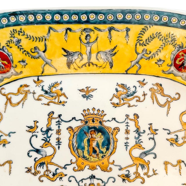 Vintage Chinese porcelain decorative platter beautifully executing the Renaissance Revival aesthetic. This platter...