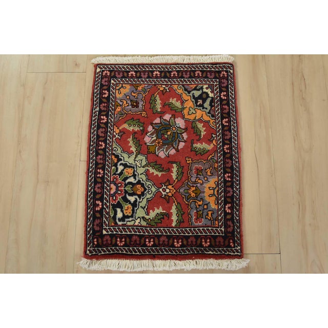 An authentic vintage traditional Bidjar rug hand-knotted with fine wool and natural dyes. This intricately woven oriental...