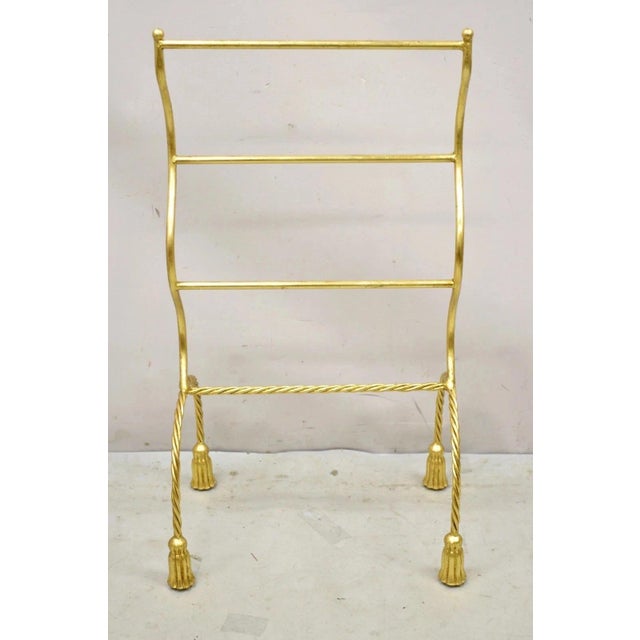 Vintage Italian Hollywood Regency Gold Gilt Metal Iron Towel Rack with Tassel Feet. Item features gold gilt finish,...