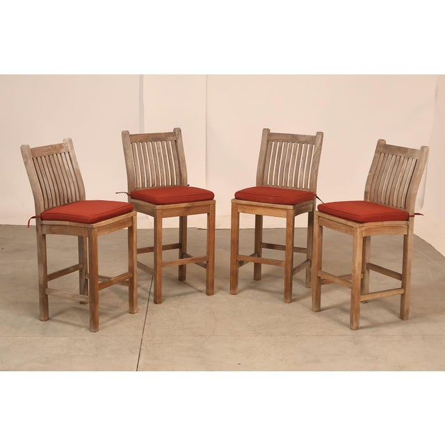 High Quality American Made Set of Four Teak Counter Stools with Upholstered Cushions and Slatted Backrests