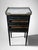 This elegant and understated French bedside table, crafted in the Napoleon III style, is distinguished by its harmonious...