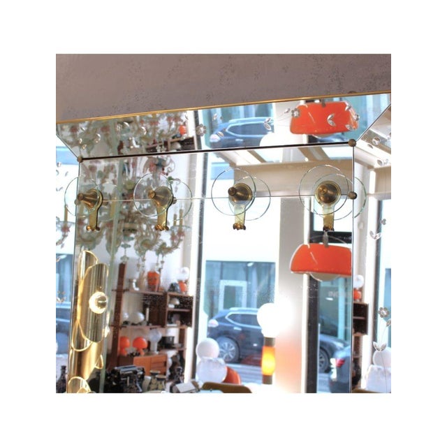 Type Floor coat rack with mirror Date 1930-40 Style Art Nouveau Origin Italy Materials Mirror, wood Condition Preserved...