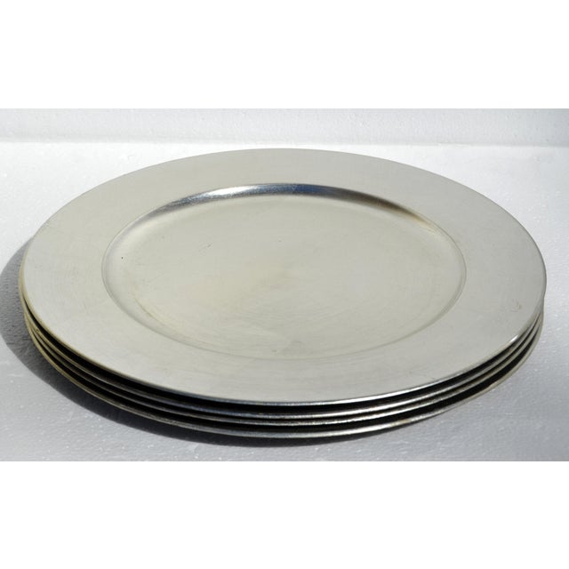 2005 Target The Bullseye Design silver lacquered 14-Inch charger plate set of 4 is a decorative, metallic-finish charger...