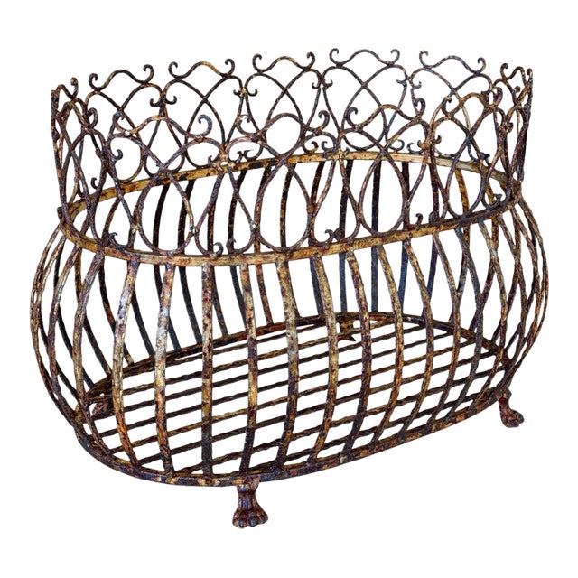 Vintage Rusted Patina Iron Jardinière With Paw Feet For Sale