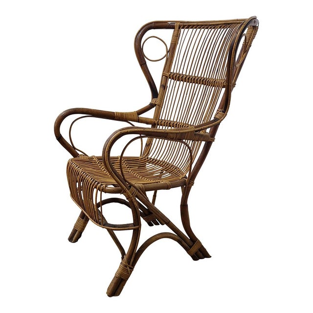Bamboo and rattan armchair. Dimensions (wxdxh) 70 x 57 x 107 cm - seat height 46