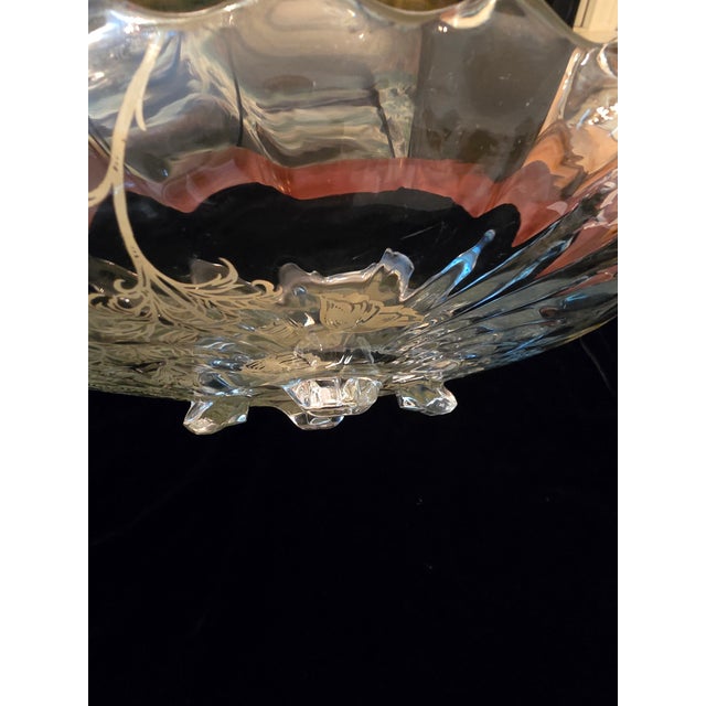 A unique vintage original dating from the pre mid century modern era silver overlay centerpiece. Having an exquisite swirl...
