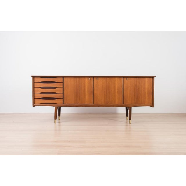 This magnificent teak sideboard was produced in Norway during the 1960s and is attributed to Brødrene Sörheim. A fine...