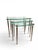 Elevate your living space with this exquisite Maison Bagues nest of tables, a true testament to timeless elegance and...