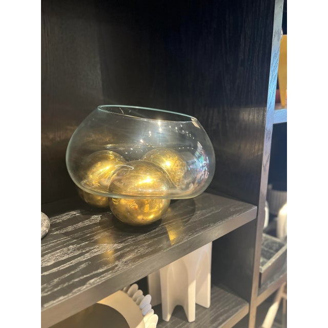 Dimensions: H 11.8"x D 13.8" Includes 3 large golden balls and 1 glass bowl Composition: Blown glass Made in an entirely...