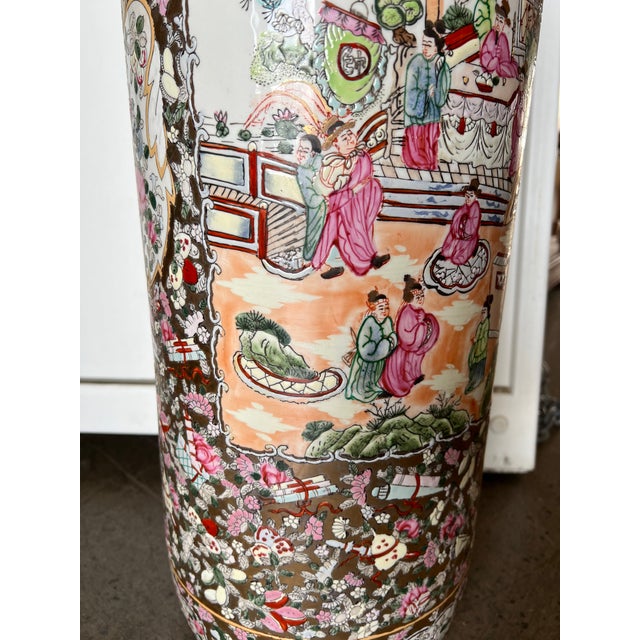 The large 24” tall cylinder porcelain stand is beautifully handpainted with a lot of gold in a lush and colorful design,...