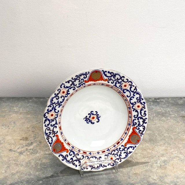 A pair of late 19th Century Royal Vienna porcelain soup bowls