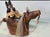An original signed mixed-media horse sculpture by Blackfeet artist Farrell Cockrum, showcasing the artist’s distinctive...