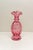 A Fenton Diamond Optic cranberry glass vase showcases the timeless craftsmanship the brand is known for. Its rich...