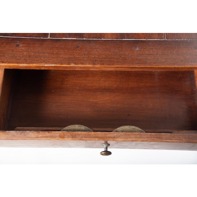 Handsome solid elm wood dining table from China extending to 110". Beautifully designed and crafted. The three paneled...