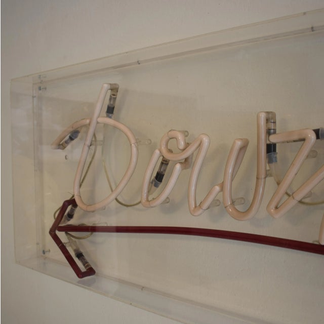 This impressive 1980s Neon sign ''Downstairs'' is placed in a acrylic showcase. It is a very cool eyecatcher for your...
