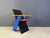Unique postmodern coloured wooden armchair in the style of gerrit Rietveld. This chair has an unknown provenance but...