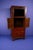 Chinese scholar's cabinet with carved floral design around the top shelf. Includes four drawers, storage space without...