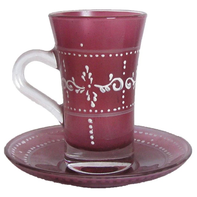 Set of 12 traditional Arabic tea or coffee cups with matching saucers, 24 pieces in all. Rose pink colored glass with with...