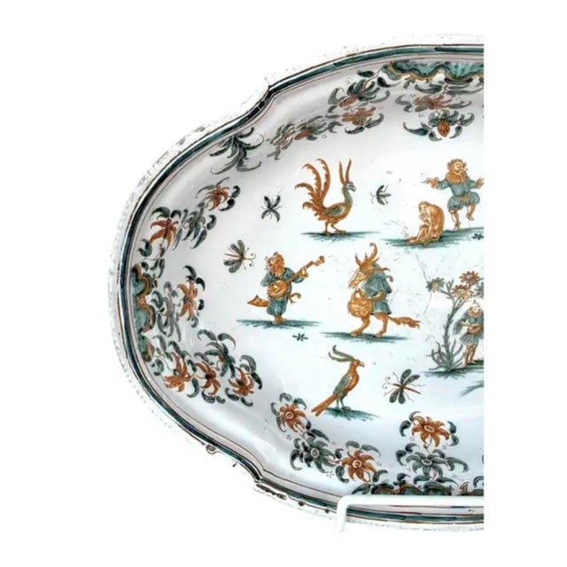 18th Century French (OLÉRYS-LAUGIER) Moustiers Faience Serving Dish with Grotesque Decor. Dish is hand-painted in the...