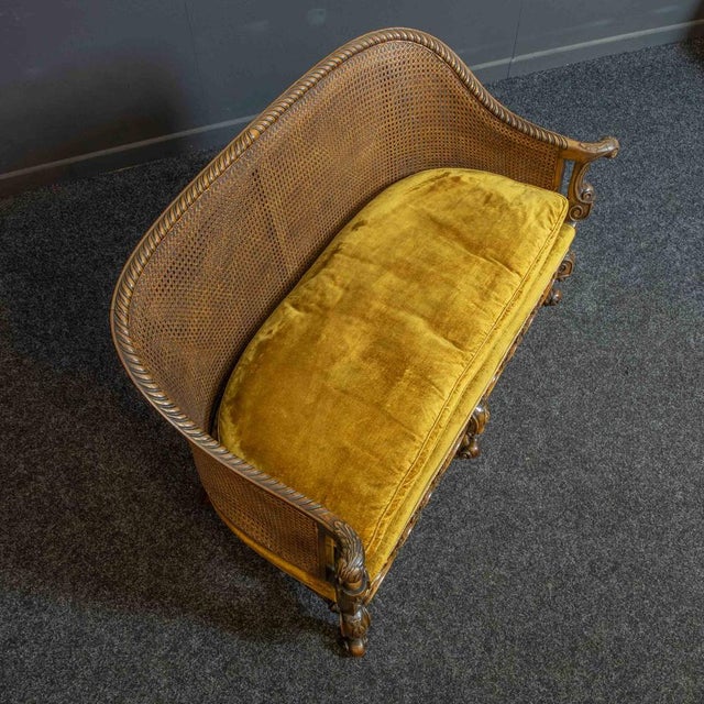 A diminutive William and Mary style walnut sofa of small proportions. The crushed gold velvet upholstery is in very good...