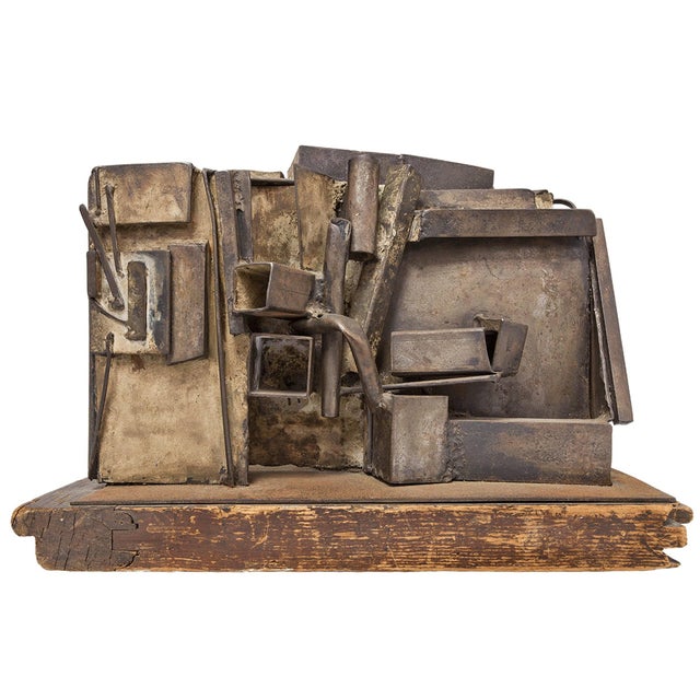 Large Abstract Expressionist Welded Assemblage Sculpture. it appears unsigned. it is on a found wood original base. it has...