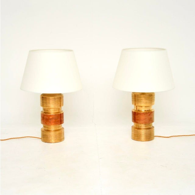 A stunning pair of vintage Italian ceramic table lamps by Bitossi. They were designed by Aldo Londi, they were made in...