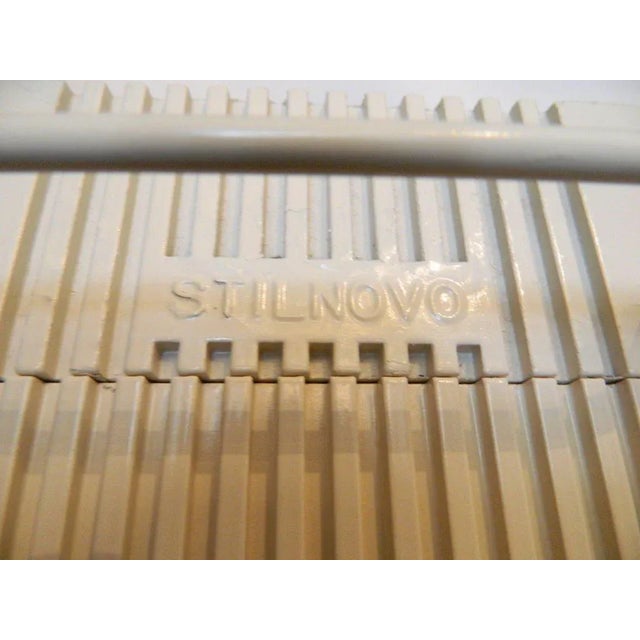 Signed Stilnovo pair of halogen lamps, light beige floor lamps. Model Zagar by Silvio Carpani, 1978. They seem darker on...