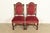 An exceptional pair of antique Victorian or Renaissance Revival side chairs or dining chairs In the manner of R.J. Horner...