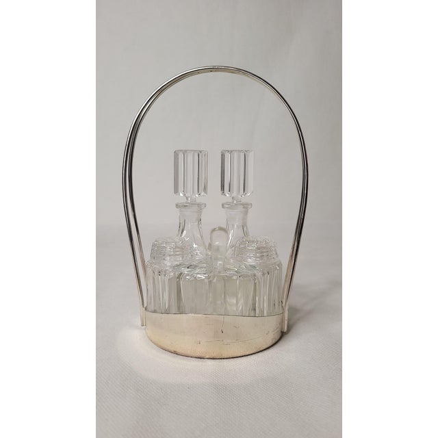 Art deco condiment server / metal & glass. The little spoon is made of plastic Height 18 cm Diameter 10 cm.