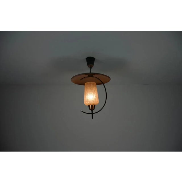 This elegant mid-century copper sputnik ceiling lamp from italy, dating back to the 1960s, is a striking example of...