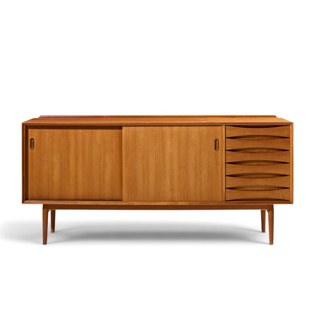 Arne Vodder for Sibast PD29 Mid Century Danish Teak Credenza This credenza measures: 72 wide x 19.5 deep x 33.5 inches...