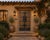 Antique Chinese Pine Compound Gate, of monumental proportions featuring iron strapping with nailheads and a very...
