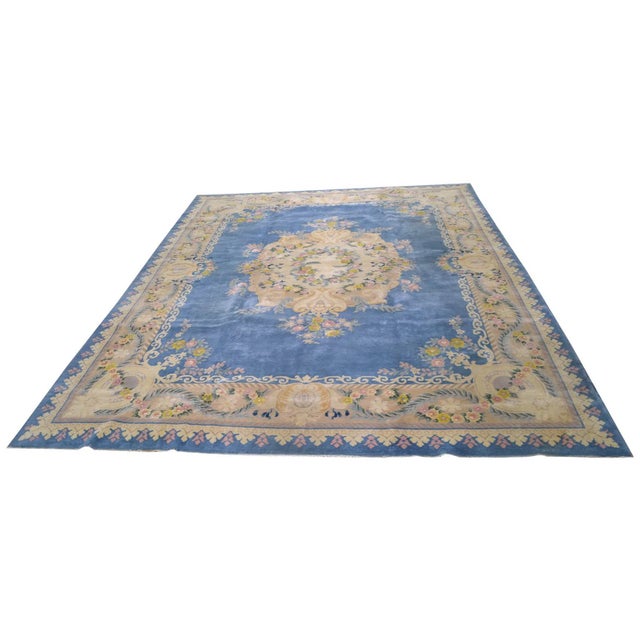 Hand-knotted with care using traditional rug-making techniques, this wool rug blends timeless craftsmanship with a modern...