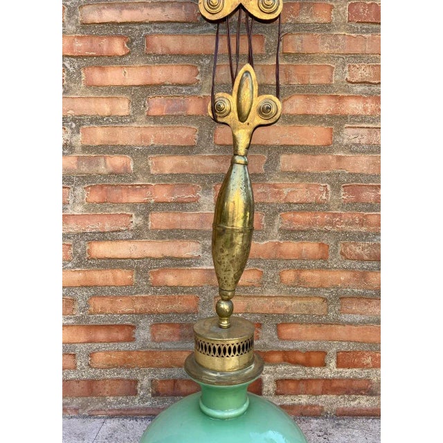 Mid Century Pulley Pendant Lamp with Opaline Green Crystal and Brass. Extendable lamp with pulley system. Made of green...