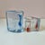 Gorgeous two-piece nesting chunky glass votive candle holder set from Kosta Boda creates an abstract heart shape. Made in...