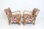 Pair of channeled armchairs with beech frames and floral upholstery. Apparently unmarked but circa 1950s, very similar to...