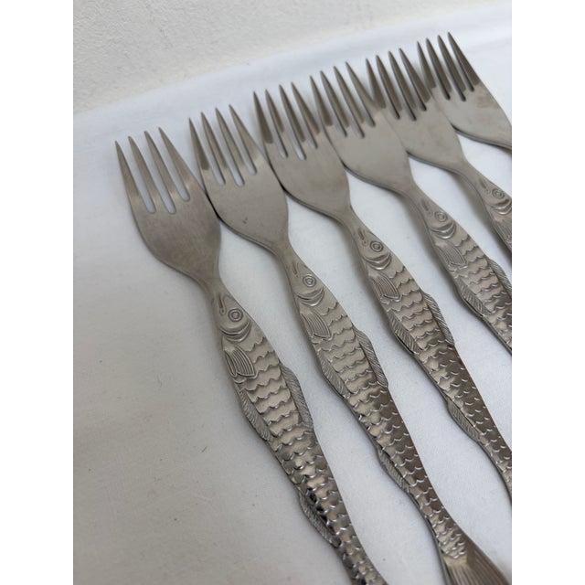 Mid-Century Cromargan Form 2500 Fish Cutlery from WMF, 1960s, Set of 12, in Good conditions. Designed 1960 to 1969 This...