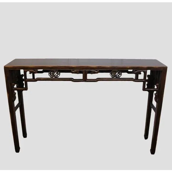 With its intricate and ornate sides and simple elegant legs, this gorgeous console is sure to attract attention in any...