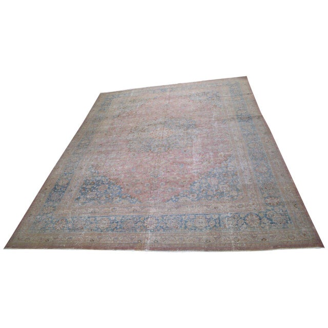 Hand-knotted with care using traditional rug-making techniques, this wool rug blends timeless craftsmanship with a modern...