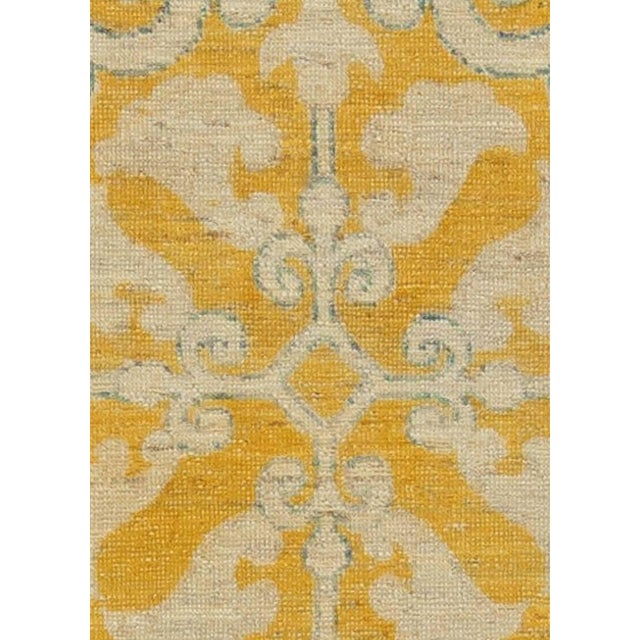 Traditional oriental inspired yellow handmade wool rug by Doris Leslie Blau. Size: 2'10" × 4'4" (86 × 132 cm). Although...