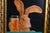 Will Bullas's "Jack with a Beer Back." A long-eared jackrabbit peers over a frosty mug of beer on a turquoise bar top, a...