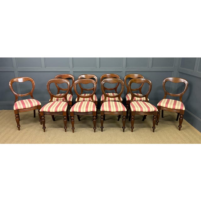 A good long set of Victorian mahogany balloon back dining chairs. Well constructed in solid mahogany and well upholstered...