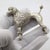 A vintage sculpture of great elegance and presence depicting a poodle, handmade in italy between the 1950s and 1960s in...
