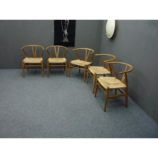 5 Wishbone or Y chairs by Hans Wegner. Manufactured by Carl Hansen & Søn Denmark. Older version from the 1960s. All chairs...
