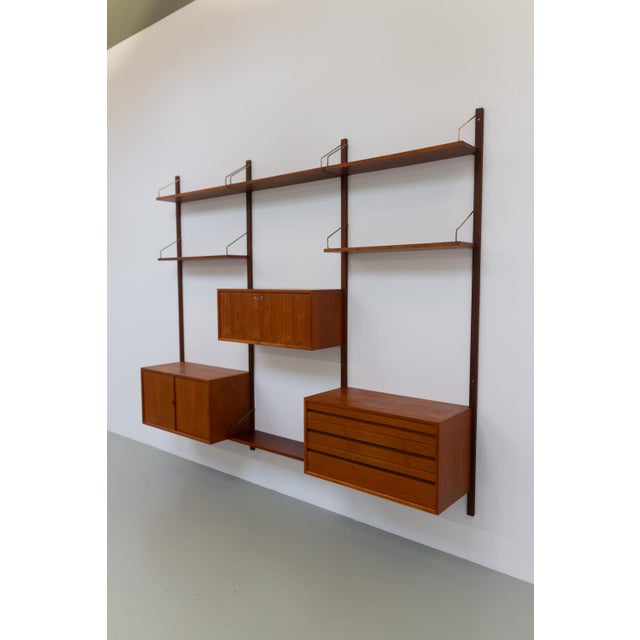 Danish Modern 3-Bay Modular Teak Wall Unit by Poul Cadovius for Cado, 1960s. Scandinavian Mid-Century Modern 3 bay...