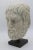 18th-century or older sculpted marble head mounted on a contemporary iron base in good condition